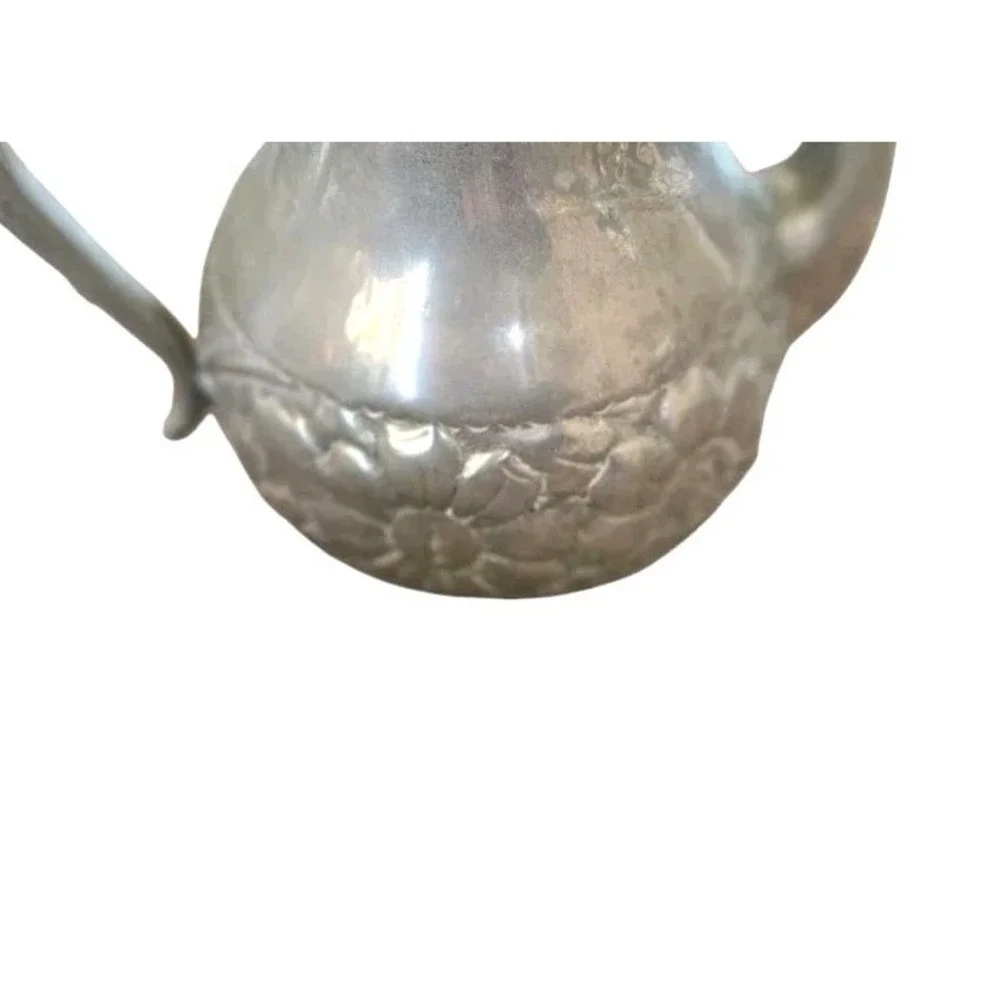 Vintage silver‎ plated teapot with hinged lid and floral engraving